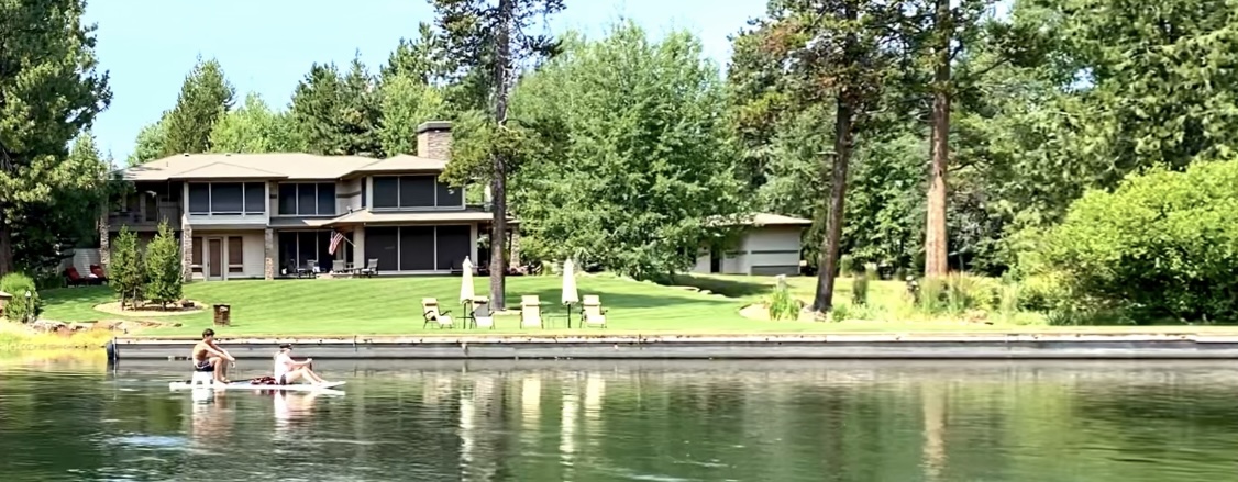 Riverside View: Home, Garage, and Slip